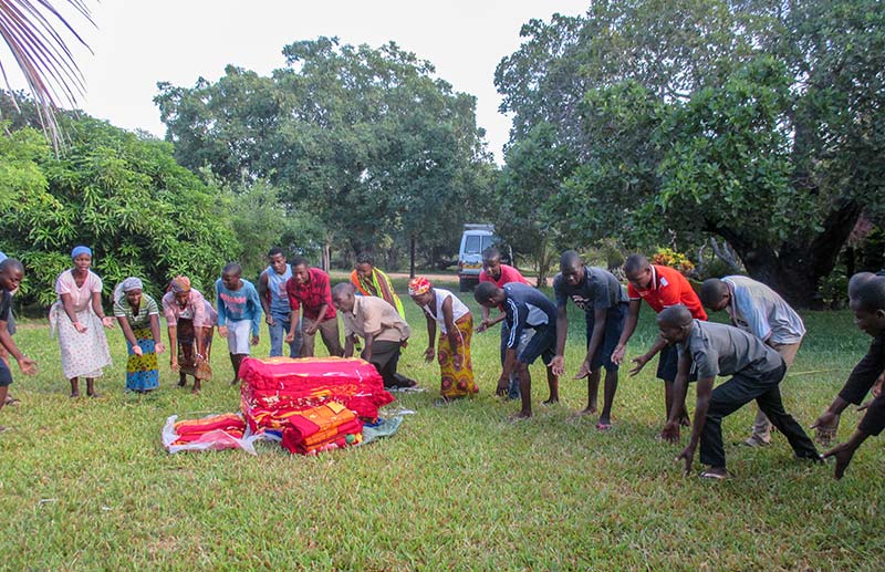 Distributing blankets for five-day evangelism outreach