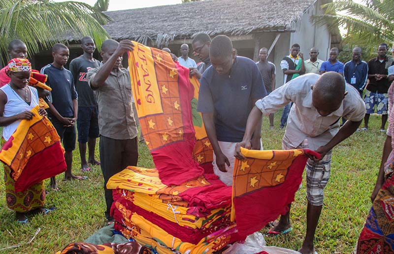 Distributing blankets for five-day evangelism outreach